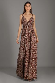 The Elise Pink Floral Maxi Dress features a plunging V-neckline and a pleated detail at the waist, paired with a voluminous floor-length skirt. The perfect style for your next special occasion. Evening V-neck Maxi Dress With Smocked Back, Flowy V-neck Lined Maxi Dress, Floral Print Maxi V-neck Party Dress, Evening V-neck Dress With Smocked Bodice, Party Maxi Dress With Smocked Back, Flowy Evening Maxi Dress With Smocked Back, Flowy Smocked Bodice Maxi Dress For Evening, Ruched Empire Waist Maxi Dress For Party, Flowy Maxi Dress With Smocked Bodice For Evening