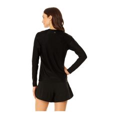 Our Copper Control Long Sleeve Rashguard is the perfect choice for any beachgoer who wants more coverage. This rashguard swim top provides UPF 50+ sun protection and a flattering, comfortable fit so you can feel comfortable while you spend all day in the water. Designed with copper-infused fabric for antibacterial and odor-control properties, you'll feel fresh and ready for sun and surf. Pair this rashguard with our Copper Control Super High Waist Tummy Control Bottoms for a complete look! Stretch Crew Neck Rash Guard With Upf 50+, Stretch Rash Guard With Upf 50+ And Crew Neck, Upf 50+ Crew Neck Swimwear, Crew Neck Swimwear With Upf 50+, Upf 50+ Beachwear Tops For Swimming, Upf 50+ Crew Neck Rash Guard For Summer, Casual Upf 50+ Rash Guard For Swimming, Long Sleeve Upf 50+ Sports Swimwear, Long Sleeve Upf 50+ Swimwear For Athleisure