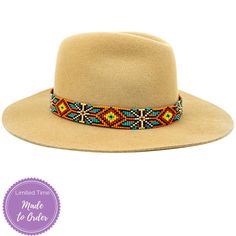 Price includes a Lola Sambboho hat & a Maui hatband. Save 10% with this bundle. Select hat size. Hatband is one size fits all. Hatband is removable.  An iconic must-have Fedora hat that will never get out of fashion. Sambboho's Lola hat has a soft brim and indented crown. A chic piece to be worn at all seasons of t Adjustable Brown Mini Hat With Flat Brim, Beige Fedora Panama Hat For Festivals, Bohemian Sun Hat With Curved Brim, One Size, Bohemian Sun Hat With Curved Brim One Size, Bohemian Fedora Straw Hat, Bohemian One-size Fedora Straw Hat, Bohemian Curved Brim Sun Hat One Size, Bohemian Beige Sun Hat With Short Brim, Country Style Adjustable Fedora Mini Hat