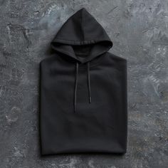 MockUp of Black Folded Hoodie on Flat Black Stone Digital File Download. Black Fleece Hoodie For Fall, Black Fleece Winter Hoodie, Black Cotton Outerwear With Kangaroo Pocket, Black Hoodie With Double-lined Hood For Streetwear, Black Sweatshirt With Double-lined Hood For Streetwear, Urban Black Hoodie With Ribbed Cuffs, Urban Black Hoodie With Drawstring, Black Urban Hoodie With Ribbed Cuffs, Black Hoodie With Adjustable Hood