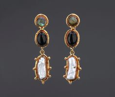 This pair of three-tier mixed stones (labradorite, black onyx, baroque pearl) earrings is a very decorative piece with contrasting colors and textures.  1. Stone shapes and sizes:    top : round labradorite button with a post : 10 mm stone copper bezel set in 14 mm brass base;     middle : oval black onyx button: 14 x 10 mm oval stone copper bezel set in 20 x 14 mm oval brass base.    bottom: a long, textured baroque pearl (23 x 8 mm) set inside a copper bezel on a studded brass base ( 30 x 17 m Exquisite Gemstone Pearl Earrings As Gift, Exquisite Gemstone Pearl Earrings For Gift, Exquisite Pearl Earrings Gift, Exquisite Pearl Gemstone Earrings As Gift, Elegant Baroque Gemstone Jewelry, Black Dangle Pearl Drop Earrings, Black Pearl Drop Dangle Earrings, Silver Pearl Earrings With Natural Stones, Elegant Onyx Jewelry With Natural Stones