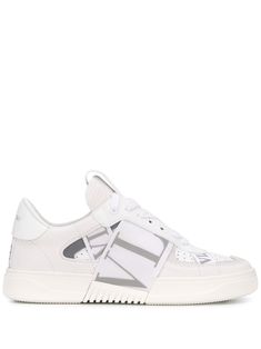 White leather VL7N low-top sneakers from Valentino Garavani featuring front lace up fastening, round toe, flat rubber sole, logo embossed tongue, perforated and a branded elasticated band on the upper. | Valentino Garavani VL7N low-top sneakers Strap Sneakers, Boot Pumps, Clean Shoes, Dream Shoes, Adidas Tubular Defiant, Ski Wear, Formal Shoes, Grey Leather, Shoe Game