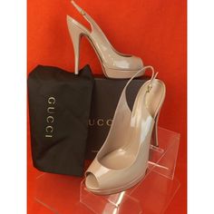 Beige Powder Patent Leather Lisbeth Peep Toe Slingback Platform Pumps Made In Italy 100% Authentic Size 40.5 Nothing Brings Italian Luxury To Mind Quite Like Gucci. Carry On The Tradition Of Superior Goods With Wares From The Legendary Italian Fashion House. Its Understandably Chic Appearance Would Surely Bring You Incredible Sumptuousness And Elegance. Covered Heel - 5 1/3" Platform - 3/4" Round Peep Toe Goldtone Buckle Adjustable Slingback Strap Leather Lining Leather Insole Leather Soles Colo Designer Patent Leather Slingback Pumps With Open Heel, Gucci Slingback Party Sandals, Gucci Slingback Sandals For Party, Spring Gucci High Heel Slingback Pumps, Gucci Pointed Toe Slingback Pumps For Spring, Gucci High Heel Slingback Pumps For Spring, Spring Gucci Slingback Pumps With Heel Strap, Gucci Spring Slingback Pumps With Heel Strap, Gucci Slingback Pumps With Heel Strap For Spring