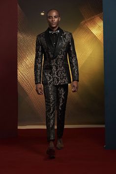 This luxury bronze tuxedo for men or women is perfect for exclusive formal events. A detailed addition to elevate your tuxedo collection. FREE SHIPPING ON ORDERS OVER $199 COLOR Black/Gold COMPOSITION N/A YARN COUNT N/A WEIGHT 290g FABRIC STYLE Jacquard OCCASION Wedding/Gala Luxury Gold Evening Blazer, Gold Tailored Tuxedo For Formal Occasions, Tailored Party Wear Blazer For Semi-formal Occasions, Elegant Tuxedo For Black-tie Festive Events, Elegant Brocade Tuxedo For Wedding, Luxury Fitted Suit For Festive Season, Luxury Gold Tuxedo For Semi-formal Occasions, Luxury Tailored Gold Tuxedo, Luxury Gold Tailored Tuxedo