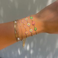 These daisy chains are the most adorable new addition to our sliding adjustable bracelets. Available in four different colors, you will love these colorful bracelets! Adjustable to any wrist size. 14k gold plated over copper Dainty Adjustable Jewelry For Spring, Dainty Adjustable Spring Jewelry, Adjustable Dainty Spring Jewelry, Dainty Spring Bracelet Jewelry, Resizable Jewelry As A Spring Gift, Spring Dainty Bracelet Jewelry, Trendy Resizable Jewelry For Spring, Resizable Jewelry Gift For Spring, Resizable Bracelets For Spring