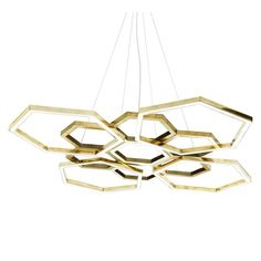 a modern chandelier that is made out of gold metal and has geometric shapes