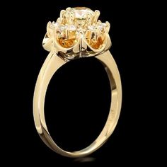 Splendid 1.15 Carats Natural Diamond 14K Solid Yellow Gold Ring Suggested Replacement Value: Approx. $4,200.00 Stamped: 14K Total Natural Round Cut Diamonds Weight: Approx. 1.15 Carats (color G-H / Clarity SI1-SI2) Center Diamond Weight is: Approx. 0.70ct (SI1 / I ) Item total weight: 4.8 grams Disclaimer: all weights, measurements and colors are approximate and may vary slightly from the listed dimensions or as seen in the image. All pictures are magnified to show the smallest of details. Pleas Luxury Diamond Flower Ring For Formal Events, Luxury Diamond Flower Ring For Formal Occasions, Luxury Flower Ring With Halo Setting For Wedding, Yellow Gold Halo Ring With Diamond, Stamped 14k, Yellow Gold Diamond Halo Ring Stamped 14k, Elegant Yellow Gold Flower Ring With Brilliant Cut, Exquisite Yellow Gold Flower Ring For Wedding, Yellow Gold Cluster Halo Ring For Wedding, Luxury Yellow Gold Flower Ring With Brilliant Cut