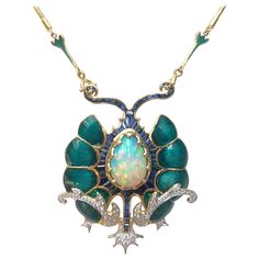 Opal 7.57 carats, Blue Sapphire 14.43 carats and Diamond 1.0 carat Necklace set in 18 Karat Gold Settings Width: 5.0 cm Length: 51.0cm Total Weight: 37.1 grams "We first opened doors in 1980 when it was then situated in the vicinity of the Victory Monument; a small and modest storefront with a couple of counters. From its humble beginnings to where it stands today, our company has proven its abilities as a jeweler. Since the beginning, we have been supplying fine quality pieces to dealers, whole Sapphire Diamond Necklace, Antique Necklaces Design, Nouveau Jewelry, Diamond Necklace Set, Blue Sapphire Diamond, Unusual Jewelry, Gold Necklace Set, Art Nouveau Jewelry, Jewelry Techniques