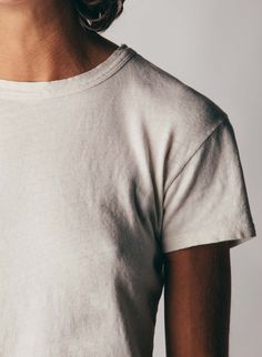 the drop tee Washed Short Sleeve T-shirt For Everyday, White Basic T-shirt For Layering, Basic White T-shirt For Layering, Everyday Washed Organic Cotton T-shirt, Simple Soft-washed Cotton T-shirt, White Distressed Short Sleeve T-shirt, Vintage Organic Cotton T-shirt For Everyday, White Distressed Fitted Tops, White Fitted Distressed Tops