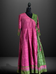 32 Kali angrakha/wrap dress with pure Tussar fabric. This one of a kind designer dress is a perfect blend of traditional yet modern attire Designer Tussar Silk Straight Kurta Dress, Designer Cotton Silk Maxi Kurta, Pink Cotton Silk Dress With Traditional Drape, Traditional Drape Pink Cotton Silk Dress, Traditional Pink Slub Silk Dress, Traditional Chanderi V-neck Dress, Tussar Silk Straight Kurta Dress, Chanderi Anarkali V-neck Dress, Chanderi Anarkali Dress With V-neck