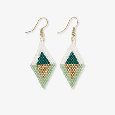 Elevate your accessory game with the Luxe Collection's Zelda Flipped Triangle Diamond Earrings. These hanger earrings feature precision-cut luxe beads in an exquisite emerald green hue, adding a touch of sophistication to your look. The flipped triangle design creates an intriguing visual appeal, making these earrings a stylish choice for any occasion. Enhance your style with the captivating and elegant ZELDA Flipped Triangle Diamond Earrings.--DETAILS-- 2.18" L, .75" WHandmade by skilled artisans in India Hypoallergenic nickel + lead-free brass hardware These accessories are made by human hands. A slight variation in size and color is considered part of the beauty of these one-of-a-kind pieces. To extend the life of your accessories, store them in a dry place while swimming, showering, or Dark Green Beaded Jewelry Gift, Dark Green Beaded Jewelry For Gift, Beaded Emerald Jewelry For May Birthstone, Beaded Emerald Jewelry Gift, Nickel Free Emerald Drop Earrings, Nickel-free Emerald Drop Earrings, Green Beaded Emerald Jewelry, Green Dangle Jewelry With Faceted Beads, Green Teardrop Beaded Earrings For Gifts