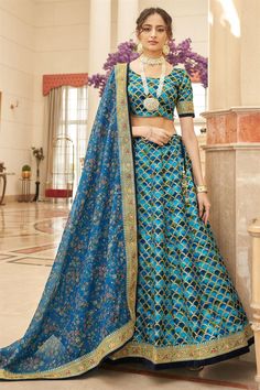 Elevate your style quotient and leave a lasting impression with our exquisite Cyan Color Lehenga. Order now and experience the perfect blend of tradition, elegance, and contemporary fashion. Lehenga Choli Designs, Ghaghra Choli, Lehenga Dupatta, Sabyasachi Lehenga, Lehenga Choli Wedding, Reception Lehenga, Blue Lehenga, Lehenga Style, Net Lehenga