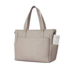 This structured tote is the ultimate do-it-all bag that you deserve. It's the perfect carryall for work, travel, and anywhere your day brings you. It features a spacious and organized interior for your essentials, a padded compartment for your laptop, side pockets for your drinks, and you can convert it into a backpack or crossbody. Crafted from premium American Saffiano leather that's waterproof and scratch-resistant, the Transform Tote will stay just as beautiful through all your travels and a Versatile Shoulder Tote Bag With Interior Card Slots, Versatile Everyday Laptop Tote Bag, Modern Weekender Tote Bag With Zipper Pocket, Modern Everyday Travel Bag With Zipper Pocket, Modern Weekender Bag With Zipper Pocket, Modern Travel Bag With Double Handle For On-the-go, Large Capacity Satchel Diaper Bag For On-the-go, Versatile Diaper Bag With Removable Pouch For Daily Use, Modern Diaper Bag With Zipper Pocket