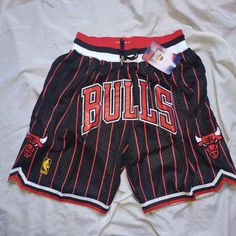 Chicago Bulls Shorts Black Strip - Basketball Shorts Store Casual Athletic Shorts With Built-in Shorts For Basketball, Cotton Three Stripes Streetwear Shorts, Basketball Team Spirit Shorts For Sports Season, Basketball Team Spirit Shorts, Casual Team-colored Basketball Shorts, Casual Basketball Shorts In Team Colors, Casual Cheerleading Shorts, Casual Shorts For Cheerleading, Casual Shorts For Cheerleading During Sports Season