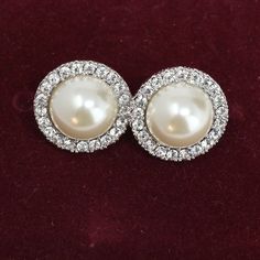 "Faux pearl earrings surrounded by simulated diamonds set in rhodium-plated silver metal.  Size is 1\" x 1\" and the color is pearl white. These earrings will go with almost everything in your wardrobe and will never go out of style. They are perfect for the office, church or a special occasion.  They would also make a great gift for someone.  They are Like New and come in an attractive gift box along with certification.   Don't miss the chance to get these gorgeous pearl earrings today.  Get yours now! NOTE:  Pearl is the birthstone for June. CLICK HERE TO SEE MORE OF MY ITEMS:  https://www.etsy.com/shop/SCLadyDiJewelry/  - THANK YOU FOR VISITING MY STORE.  CHECK BACK OFTEN TO SEE NEW ARRIVALS. VISIT ME AT: https://www.etsy.com/shop/SCLadyDiJewelry/ https://www.etsy.com/shop/StetsonCollec Faux Pearl Earrings, Columbia Sc, Button Earrings, Etsy Gift Ideas, Birthday Gift For Her, Pierced Earrings, Birthday Gifts For Her, Wedding Earrings, Earrings Silver