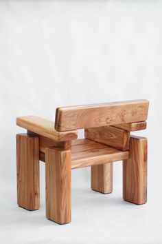 a wooden bench sitting on top of a white background