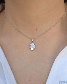 Some locket love! Dainty sterling silver locket suspended from a silver chain. From Doyle & Doyle, in New York. #doyledoyle #lockets #silverlocket 40 Anniversary, Oval Locket Necklace, Jewelry Wishlist, Pretty Accessories, Birthday Necklace, Bday Gift, Sterling Silver Locket, Oval Locket, Silver Locket