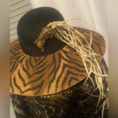 All My Hats That You Will See Ste All One Of A Kind Designed By Me I Call This One Jungle Fever.. It Has A Beautiful Crystal. Zebra Head On It With Feathers Leaves And Trimmed With Pom-Poms. The New Hat Is By Jessica Simpson And Then I Added My Magic The Cover-Up Is Beautiful. It’s Sheer One Size Fits All. Fit Up To An Extra Large.. Has Beading On The Yoke Really Pretty There Is Straw Raffia Trim. . And Fun. All The Hats That You Will Be Seeing Are One Of A Kind Just Like Me? Trendy Fitted Beach Hats, Fitted Brown Sun Hat For Vacation, Chic Fitted Sun Hat For The Beach, Trendy Party Hats For Beach Season, Chic Festival Sun Hat For Summer, Chic Summer Festival Sun Hat, Summer Party Straw Hat, Black Straw Hat For Spring Festival, Black Summer Straw Hat For Sunbathing