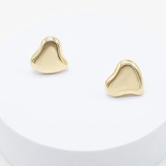 our Crazy On You Studs are an essential addition to any wardrobe. these elegant yet whimsical earrings will add brilliance and a hint of playfulness to any ensemble, day or night. 18k gold or rhodium pvd over 316L stainless steel 19.5mm x 20mm post sits at center of earring lightweight Modern Gold Plated Plug Earrings For Gift, Modern Gold Plated Plug Earrings As Gift, Modern Gold-plated Plug Earrings As Gift, Yellow Gold Stainless Steel Earrings For Gift, Gold Heart Earrings Modern Style, Modern Gold Heart Earrings For Pierced Ears, Trendy Polished Finish Earrings For Gift, Modern Gold Heart Earrings For Anniversary, Modern Matte Gold Earrings For Gift