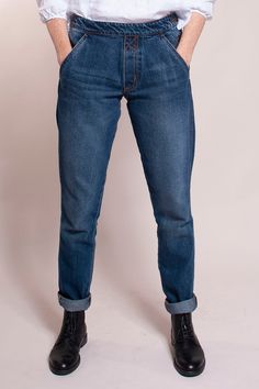 Low rise, side button closure, slim leg, and back patch pockets. Dark wash. 100% cotton. Painter Jeans, Back Patch, Slim Leg, Slim Legs, Patch Pocket, Low Rise, Levi Jeans, Mom Jeans, Painter