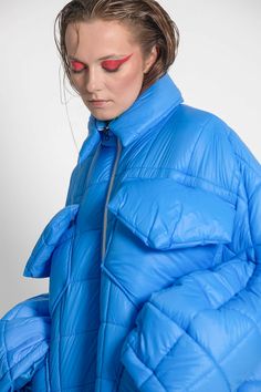 Unisex quilted jacket "Lupinus Light Blue" features a round shoulder and oversized fit for a relaxed, comfortable feel. It's made from lightweight, wrinkle-free polyester and has large pockets, windproof, and water repellent properties. The soft, bold shape makes it a statement piece, and the hypoallergenic synthetic padding adds warmth without compromising style.Size Guide:ONE SIZE (fits to XS-XL)Collar - 51 cmWides middle line - 170 cmBottom line - 140 cmSleeve ends - 57 cmLength from the neck Oversized Puffer Outerwear For Outdoor Activities, Oversized Nylon Puffer Jacket With Pockets, Oversized Quilted Nylon Outerwear, Oversized Outdoor Puffer Jacket With Pockets, Oversized Puffer Jacket With Pockets For Outdoor, Outdoor Nylon Quilted Jacket With Pockets, Spring Nylon Quilted Jacket With Pockets, Outdoor Quilted Nylon Jacket With Pockets, Oversized Outdoor Puffer Outerwear