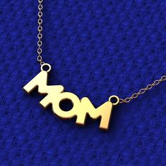 Beautiful minimalist mom tiny letter pendant engraved in 14k gold with an adjustable 16 to 18 inch, 14k cable chain. This mom letter necklace will give a truly memorable, perfect gift for your mother. All our products are only made by hand with great attention. Mom text pendant Mom Jewelry Mother's day gift casual, typical, simple, handmade pieces vintage, elegant design, Minimalist Minimalist pendant chain Minimal Delicate cute jewelry pieces key chain pendant for her gift Necklace promise Pendant necklace for women very small classic pendant necklace unfussy jewelry design super simple charm clean fashion style trending Tiny, Stacking, Stackable, Engagement statement anniversary proposal Shiny Lined Notched necklace daily worn Necklace special occasions Trendy Design Gifts for Mom Brides Classic Pendant Necklace, Clean Fashion, Emerald Earrings Studs, Mom Jewelry, Letter Pendants, Letter Necklace, Adjustable Necklace, Chain Pendants, Birthday Gifts For Her