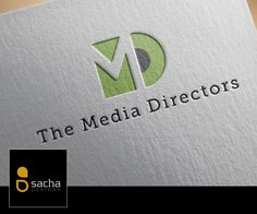 the media director's logo is displayed on a white paper with black and green accents