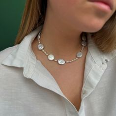 **White Coin Pearl Necklace | Irregular Baroque & Button Pearl Choker** Elevate your style with our White Coin Pearl Necklace, a sophisticated blend of natural coin pearls, irregular Baroque pearls, and button pearls. This necklace offers a modern twist on timeless elegance, perfect for any occasion. **Key Features - **White Coin Pearl Necklace Showcases lustrous, flat coin pearls that add a refined and elegant touch to your look, creating a modern and sleek accessory. - **Irregular Baroque Pear Coin Pearl Necklace, Necklace Woman, Baroque Pearl Necklace, Coin Pearls, Round Button, Pearl Choker, Baroque Pearls, Halloween Shopping, Womens Necklaces