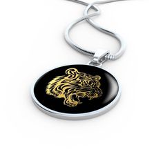 "This Tiger Necklace Is the Perfect Gift Whether for Yourself or a Loved One. Explore all our Symbolic Jewelry here: https://www.etsy.com/in-en/shop/SymbolicPresent?ref=seller-platform-mcnav§ion_id=22069637 ➜ Our jewelry is made of high-quality surgical steel with a shatterproof liquid glass coating and an 18k gold finish option. ➜ Engrave onto the back of the Tiger pendant your loved one's name, your wedding date, an anniversary, or anything else you want to remember and keep you close to her h Gift Sterling Silver Snake Chain Jewelry, Box Chain Pendant Necklaces As Gift, Sterling Silver Snake Chain Jewelry Gift, Spiritual Box Chain Necklace As Gift, Spiritual Box Chain Necklace Gift, Pendant Necklace With Box Chain As Gift, Stainless Steel Box Chain Jewelry, Stainless Steel Round Pendant For Jewelry Making, Spiritual Metal Chain Necklace For Gift