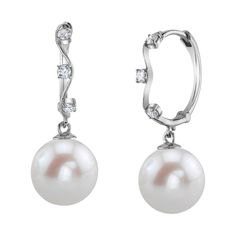 These exquisite pearl huggie earrings add a touch of elegance to any occasion. These earrings feature two lustrous 10mm AAAA quality Freshwater pearls, hand picked for their gorgeous luster and unblemished surface. The pearls are mountings on 14K white gold. Elegant Clip-on Huggie Earrings, Formal Pearl Hoop Earrings With Pearl Charm, Elegant Formal Huggie Earrings With Lever Back, Elegant Silver Huggie Earrings For Wedding, Elegant Huggie Clip-on Jewelry, Elegant Clip-on Huggie Earrings As Gift, Elegant Clip-on Huggie Earrings For Gift, Classic Pearl White Pearl Hoop Earrings, Classic Pearl White Hoop Earrings