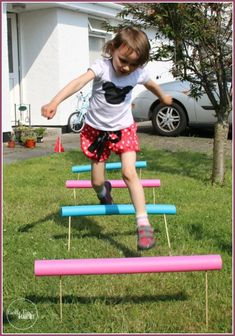 30 Ways To Make Your Own Summer Olympics - Playtivities Toddler Olympic Games, Kids Olympic Games Field Day, Olympic Theme Preschool Lesson Plans, Olympic Field Day Games, Mini Olympics For Kids, Backyard Olympics For Kids, Olympic Sensory Bin, Olympic Birthday Party For Kids, Paris Olympics 2024 Party