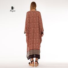 Introducing our stunning Brown Bat Wing Maxi Dress, a true statement piece for your wardrobe! This elegant long sleeve long dress is perfect for any occasion, whether you're dressing up for a special event or simply looking to add a touch of glamour to your everyday style. The unique bat wing design adds a fun and playful twist to this classic silhouette, making it a must-have piece for any fashion-forward individual. Elevate your look with this effortlessly chic and versatile dress that will tu Spring Vacation Long Sleeve Abaya, Summer Long Sleeve Flowy Abaya, Summer Flowy Long Sleeve Abaya, Flowy Long Sleeve Summer Abaya, Flowy Summer Abaya, Spring Bohemian Maxi Abaya, Long Sleeve Maxi Dress For Vacation, Brown Long Sleeve Boho Dress For The Beach, Long Sleeve Brown Boho Dress For The Beach