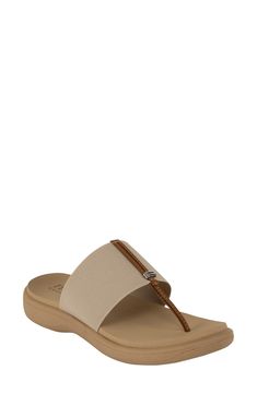 Show off beachy style with this slide sandal featuring a thong toe, comfortable elastic strap and comfortable cushioned footbed. 1" heel Synthetic upper, lining and sole Made in Italy Synthetic T-strap Sandals For Beach, Slip-on Synthetic T-strap Sandals For Beach, Beige Synthetic T-strap Sandals For Beach, Synthetic Slip-on T-strap Sandals For Beach, Cushioned Synthetic T-strap Sandals For Vacation, Adjustable T-strap Synthetic Sandals With Cushioned Footbed, Synthetic Toe Loop Sandals For Vacation, Summer Travel Slip-on Sandals, Beige Synthetic Toe Post Flip Flops