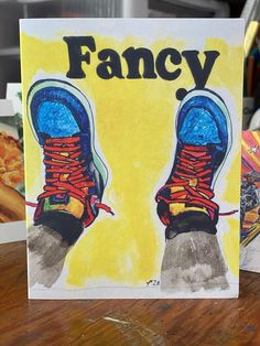 a greeting card with an image of a pair of shoes on it and the words fancy