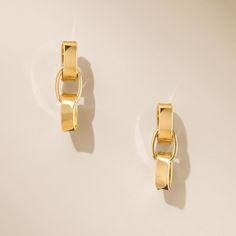 Discover effortless elegance with our Luna Link Earrings. Made from sterling silver and finished with 14K gold plating, these refined drops bring a touch of modern sophistication to any outfit. Versatile and chic, they are perfect for both daily wear and special moments. Product Details: Made from 14K gold plated .925 sterling silver Measures approximately 0.75" total length Post & Friction Triple Oval Link Drop Earring AL200130V Made in Italy Elegant Linear Drop Earrings With Polished Finish, Elegant Yellow Gold Linear Earrings In Sterling Silver, Elegant Yellow Gold Sterling Silver Linear Earrings, Chic Gold-tone Hoop Earrings For Formal Occasions, Luxury Gold Linear Earrings For Formal Occasions, Elegant Linear Gold-plated Earrings In Yellow Gold, Elegant Yellow Gold Plated Linear Earrings, Elegant Yellow Gold Linear Drop Earrings, Gold-tone Polished Earrings