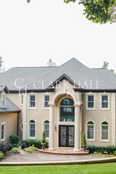 a large white house with columns and windows