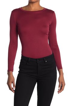 A ribbed crew neck bodysuit is the perfect layering option for a sleek, trendy look. Fit: this style fits true to size. Crew neck. Long sleeves. Snap gusset closure. Solid. Knit construction. Approx. 30” length (size S). Imported Trendy Stretch Long Sleeve Top For Work, Fitted Scoop Neck Bodysuit For Fall, Ribbed Stretch Bodysuit For Fall, Fitted Long Sleeve Top For Work, Long Sleeve Bodysuit For Layering, Fitted Casual Bodysuit For Layering, Casual Bodysuit For Layering, Casual Solid Bodysuit For Layering, Casual Bodysuit With Scoop Neck For Fall