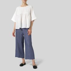 VIVID LINEN Workwear Pleated Tops With Relaxed Fit, Pleated Relaxed Fit Top For Work, Relaxed Fit Pleated Top For Work, Chic Blouse With Pintucks, Chic Pleated Tops For Work, Chic Cropped Relaxed Fit Tops, Chic Cropped Tops With Relaxed Fit, Casual Pleated Short Sleeve Blouse, Casual Pintuck Blouse For Summer