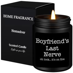 a candle that is in front of a box with the words boyfriend's last nerve on it