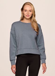 Our In The Studio Cropped Pullover combines a classic crewneck design and super soft, trendy scuba fabric for a lightweight pullover you can take from studio to street. A slightly cropped length is complemented by a relaxed fit, dropped shoulders and sporty seaming detail that allow for easy styling and layering. Throw this cute crop sweatshirt over a sports bra for a workout or pair it with jeans for a casual-cute look. Cropped Pullover, Scuba Fabric, Crewneck Design, A Workout, In The Studio, Crop Sweatshirt, The Studio, Drop Shoulder, Layering