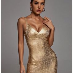 Beautiful Gold,Sexy Cocktail Dress. A Showstopper Bandaid, Stretchy, Tight, Flattering. Elegant Party Mini Dress With Built-in Bra, Fitted Bandage Dress For Party Season Date Night, Elegant Bodycon Dress With Built-in Bra For Night Out, Gold Spaghetti Strap Bodycon Dress For Night Out, Bodycon Bandage Dress For Night Out And Party Season, Gold Spaghetti Strap Bodycon Dress For Party, Glamorous Fitted Bandage Dress For Date Night, Elegant Fitted Bodycon Dress With Built-in Bra, Glamorous Fitted Bandage Dress For Party Season