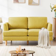 a living room scene with focus on the sofa