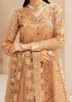 Introducing our Luxury Wedding Collection by Ramsha to make you look and feel your best These pieces will add a touch of class and elegance to your wardrobe. This collection is a beautiful collection of ensembles offering versatile compositions for the latest festive wardrobe requirements. Embroidered Handmade Front Body Embroidered Back Body With Sequence Embroidered Handmade Front And Back Kali With Sequence Embroidered Handmade Sleeve With Sequence Embroidered Dupatta With Sequence Raw Silk For Lining Raw Silk Trouser. Color: There might be slight color variation due to lighting and flashes during the photo shoot. The color may also vary because of different screen resolutions. Wash Care: Dry Clean Only. Semi-stitched Party Wear Sets With Sheer Dupatta, Gold Floor-length Churidar With Sheer Dupatta, Gold Floor-length Churidar With Zari Work, Elegant Churidar With Sheer Dupatta For Navratri, Elegant Floor-length Anarkali Set For Navratri, Designer Dabka Churidar For Party, Elegant Navratri Anarkali Set With Resham Embroidery, Party Wear Churidar With Dabka For Eid, Elegant Resham Embroidery Anarkali Set For Navratri