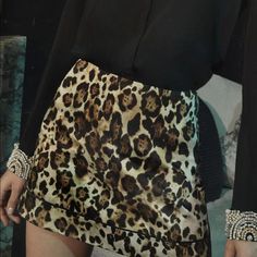 Sleek A-Line Mini Skirt In A Bold Animal Print With Satin Piping. Sold Out Concealed Back Zip Stretch Lining Polyester Dry Clean Fall Leopard Print Skirt For Party, Leopard Print Skirt, A Line Mini Skirt, Print Skirt, Printed Skirts, Piping, Black And Brown, Mini Skirt, Leopard Print