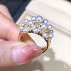 Highline: Famous Style Product Information OriginJapan MaterialAkoya Pearl, 18k Gold, and Natural Diamonds DimensionsRing Weight 12.0 g Pearl Shaped: Round Size: 2.5-4.5 mm Quality: AAA Nacre: Very Thick Color: White Luster: Very High Accessories Metal: 6.1 g of 18k Gold Other: 0.52 ct of SI Quality Natural Diamonds Luxury Cluster Yellow Gold Diamond Ring, Akoya Pearl Rings With Diamond Accents, Luxury Gold Cluster Diamond Ring, Diamond White Brilliant Cut Akoya Pearl Ring, Diamond White Akoya Pearl Ring With Brilliant Cut, Fine Jewelry Akoya Pearl Rings With Brilliant Cut, White Akoya Pearl Rings With Diamond Accents, White Akoya Pearl Diamond Ring With Brilliant Cut, Fine Jewelry Yellow Gold Rings