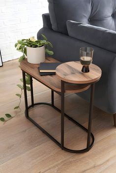 a living room with a gray couch and coffee table