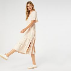 Say hello to the Margaux Tiered Ruffle Sleeve Dress, the epitome of effortless style! With its relaxed fit, this dress ensures you feel comfortable and confident all day long. The longer ruffle sleeves add a chic twist, while the decorative buttons give it a hint of sophistication. Plus, it's equipped with pockets to keep your essentials close at hand. Perfect for both casual outings and special events, this dress is a must-have in your wardrobe! Materials: Viscose. Poncho Jacket, Ruffle Sleeve Dress, Poncho Sweater, Flutter Sleeve Top, Pocket Leggings, Pink Maxi Dress, V Neck Tops, Jeans Dress, Black Leggings