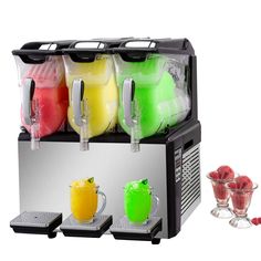 a machine that has some drinks in it and two cups with strawberries on the side