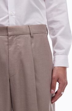 Crisp creases elevate stretch-kissed suit pants that are a sophisticated addition to any office wardrobe. 30 1/2" inseam; 20" leg opening; 12" front rise; 16 1/2" back rise (size 32) Zip fly with hook-and-bar closure Front slant pockets; back welt pockets 84% polyester, 14% viscose, 2% elastane Dry clean Imported Formal Stretch Wide Leg Dress Pants, Formal Stretch High-waisted Dress Pants, High-waisted Stretch Dress Pants For Formal Occasions, Stretch High-waisted Dress Pants For Formal Occasions, Classic Office Bottoms With Concealed Placket, Tailored Wide Leg Pleated Dress Pants, Tailored Pleated Wide Leg Dress Pants, Formal Stretch High-waisted Work Pants, Semi-formal Stretch Bottoms For Spring