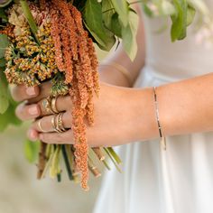 Adorn your wrist in delicacy with a bangle from the KMJ Legacy Collection. The pairing of 18ky gold and oxidized Argentium silver makes this bangle unique; four flush-set reclaimed diamonds turn unique into exquisite. Wear the Legacy Diamond Bangle Bracelet alone or paired with the Black + Gold Stacker Bangle for beauty times two. You choose the outfit, count on KMJ for the jewelry. 18ky recycled gold Oxidized Argentium silver VS quality .02 ctw reclaimed diamonds Handmade Bangles are sold separ Modern Hand-set Bangle For Wedding, Elegant Hand Forged Yellow Gold Bangle, Hand Forged Bangle For Wedding, Dainty 14k Gold Bangle For Wedding, Stackable Sterling Silver Bracelet For Wedding, Minimalist Stackable Cuff Bracelet For Wedding, Elegant Hand Forged Bracelets For Anniversary, Wedding Stackable Yellow Gold Bracelet, Stackable Yellow Gold Wedding Bracelet